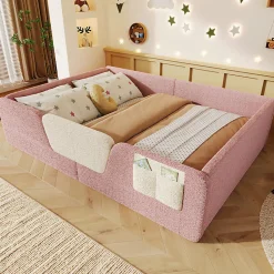 Lit enfant capitonné 140x190 cm - avec barrières de sécurité amovibles - avec sac de rangement - rose (matelas non inclus)