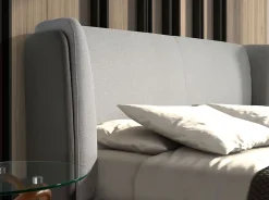 Lit moderne en tissu gris clair et similicuir noir pour chambre élégante