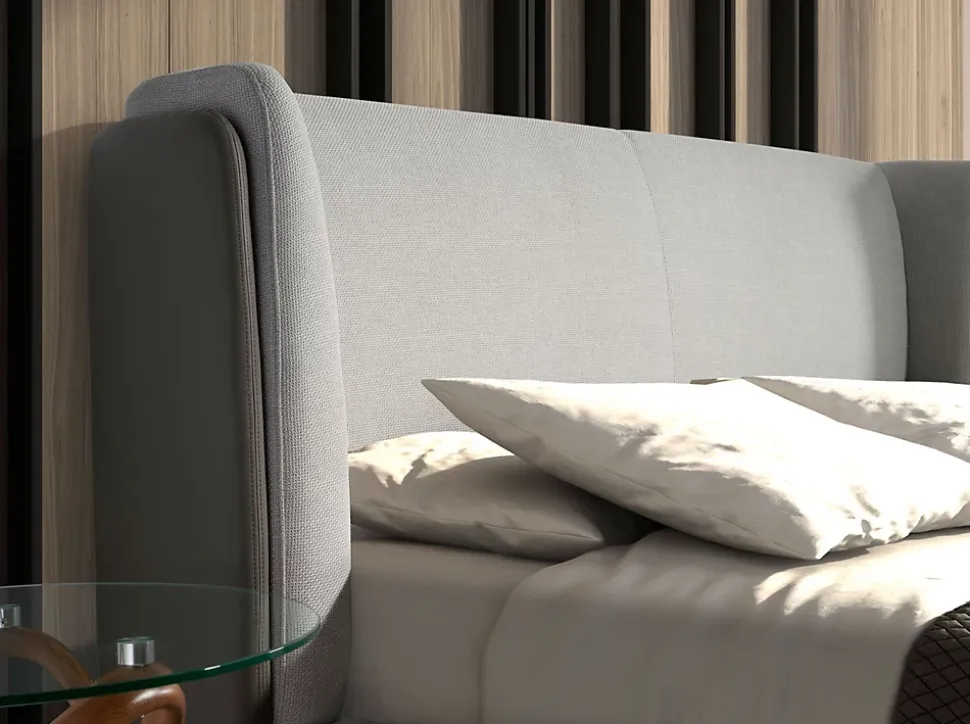 Lit moderne en tissu gris clair et similicuir noir pour chambre élégante