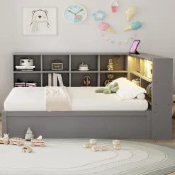 Lit simple 90 par 200 cm en bois massif avec prises multiples rangements et barre lumineuse systeme hydraulique gris