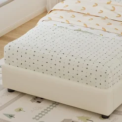 Lit 90x200 cm avec tête en forme de biscuit beige, cadre PU et métal, dossier rembourré et bords mousse