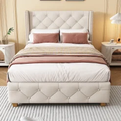 Lit 90x200 cm tapissé lin beige avec tête de lit capitonnée, clous décoratifs et pieds en bois renforcés