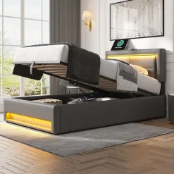 Lit 90x200 cm tapissé PU gris avec éclairage LED, ports USB escamotables et rangement intégré