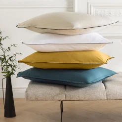 Lot de 2 taies d'oreiller unies en coton finition bourdon 50x70cm